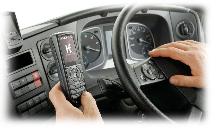The phone is secured to the dash for safety and has permanent power from the vehicles ignition.